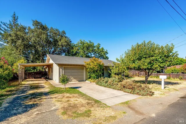 a view of a house with a patio