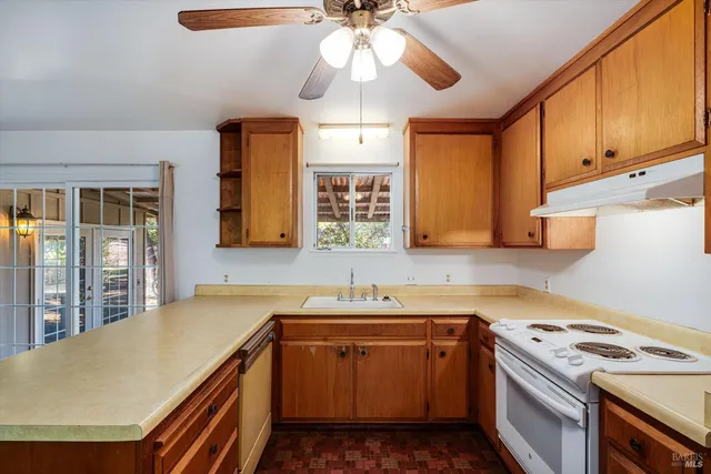 a view of a refrigerator and window