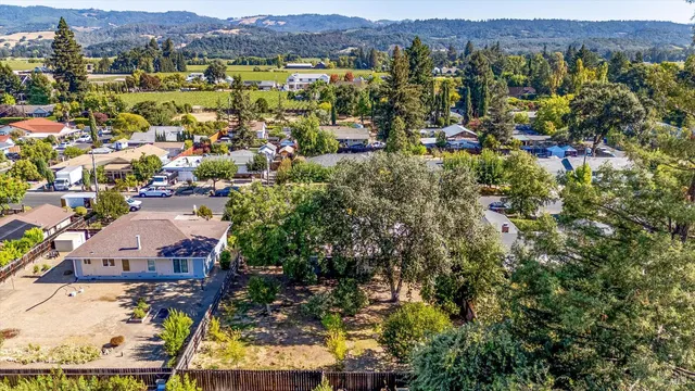 a view of outdoor space with signage and flags