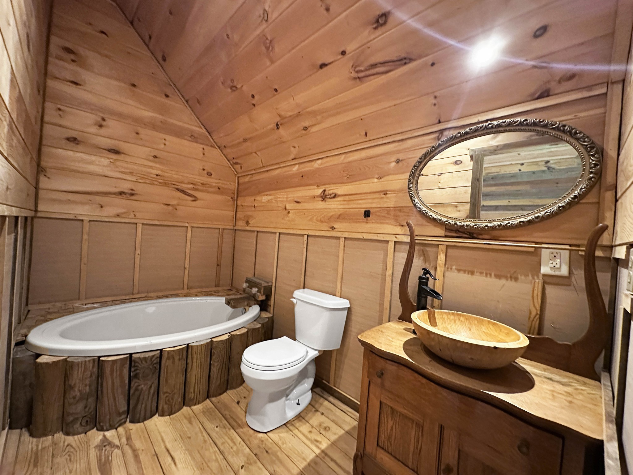 3172 Highway 76 Portland, TN 37148 - Photo 33 of 49 a bathroom with a sink a toilet and a mirror