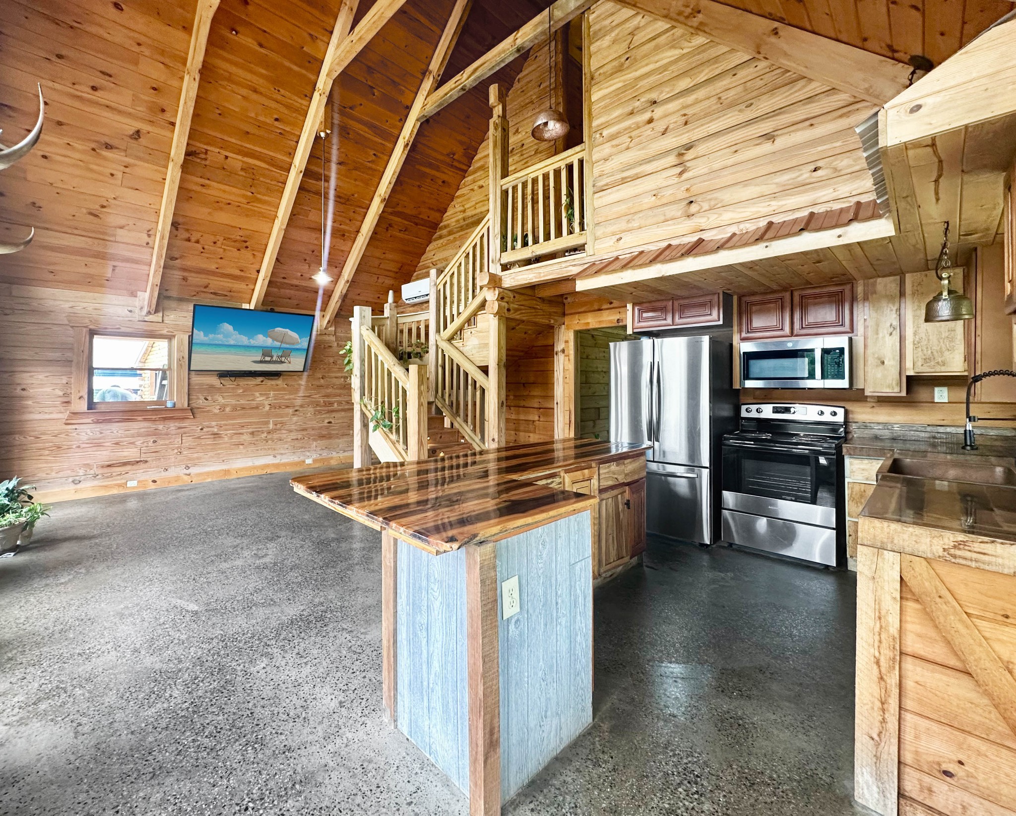 3172 Highway 76 Portland, TN 37148 - Photo 7 of 49 a kitchen with stainless steel appliances granite countertop a stove and cabinets