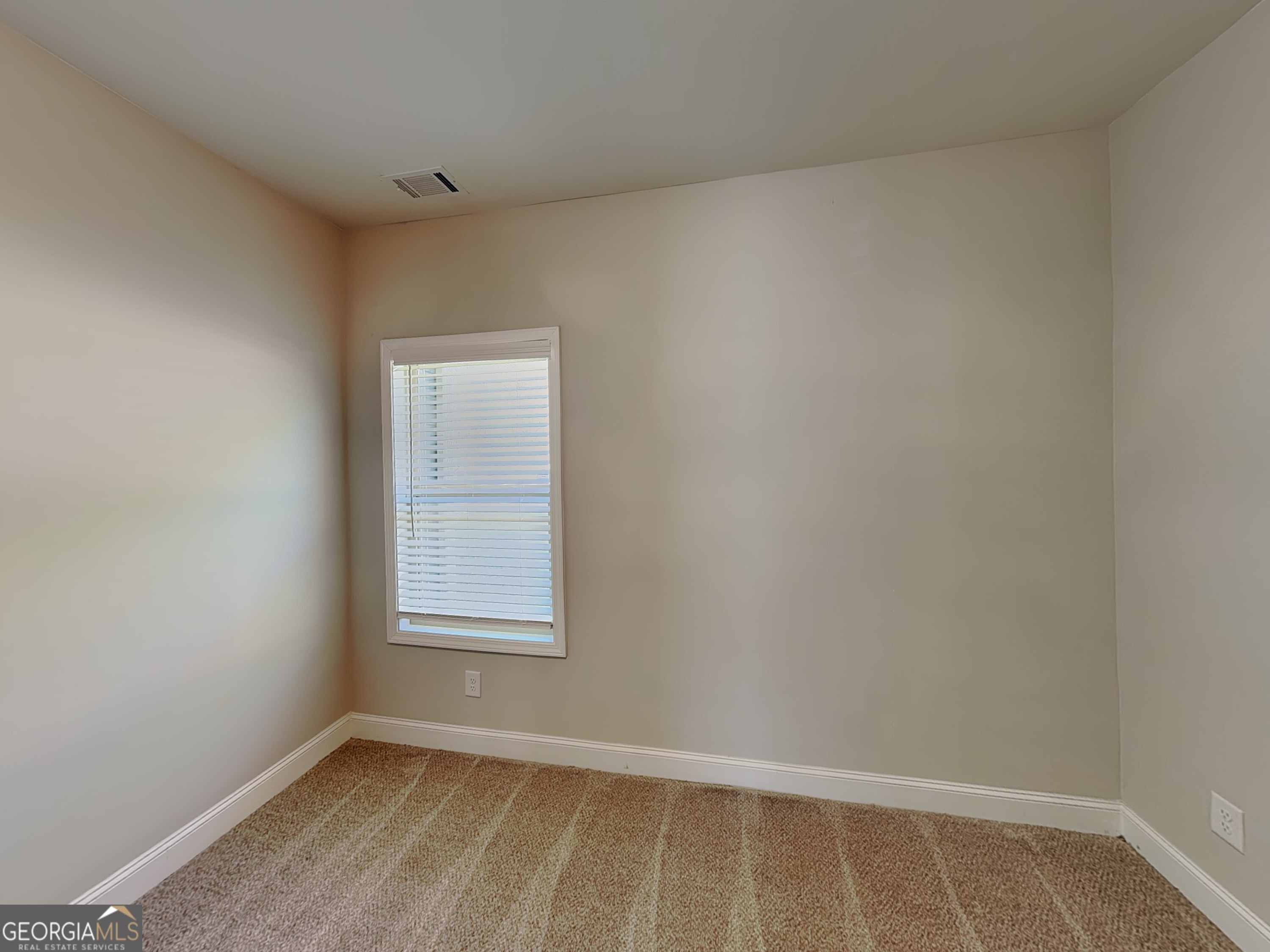 1720 Cobblefield Circle Dacula, GA 30019 - Photo 12 of 23 a view of an empty room and window