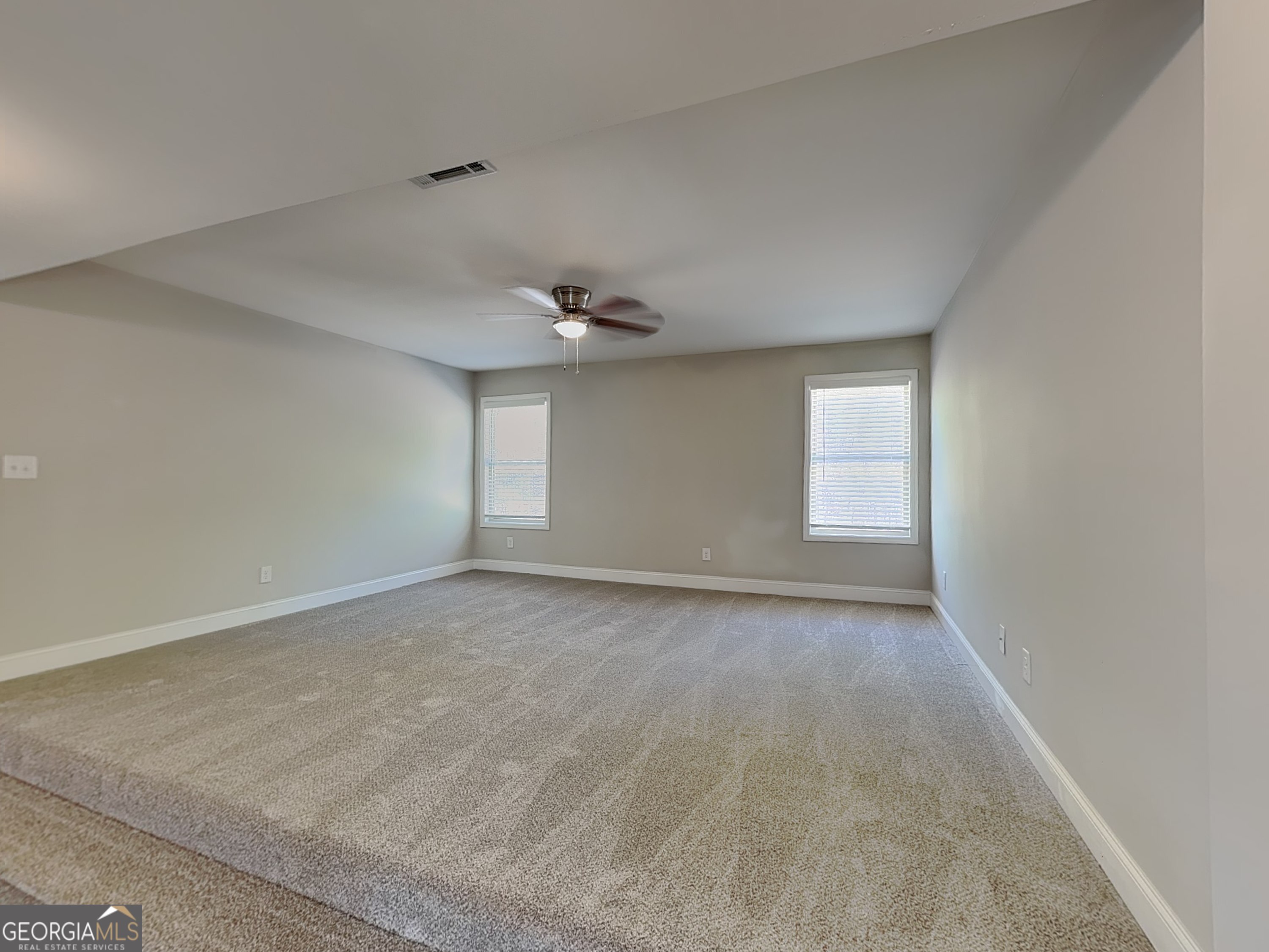 1720 Cobblefield Circle Dacula, GA 30019 - Photo 20 of 23 an empty room with a empty space and window