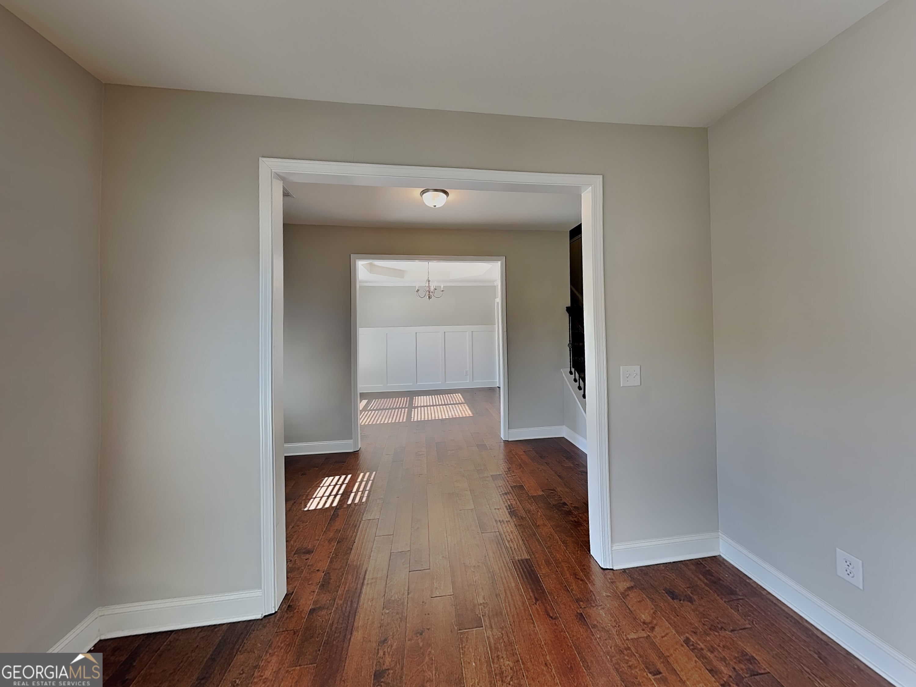 1720 Cobblefield Circle Dacula, GA 30019 - Photo 6 of 23 a view of a hallway with wooden floor