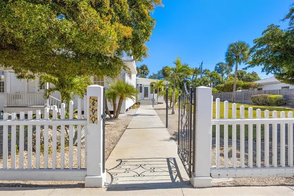 a view of a house with a street