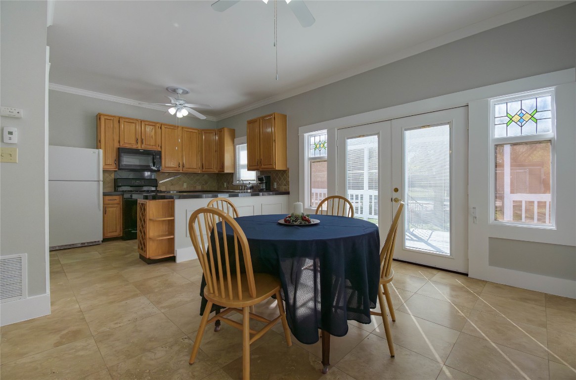 307 Walnut Drive East Austin, TX 78753 - Photo 13 of 34 a dining room with furniture and window