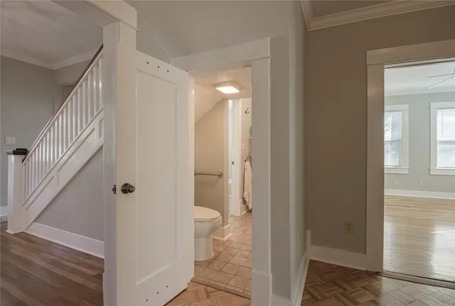 a view of a bathroom from a hallway