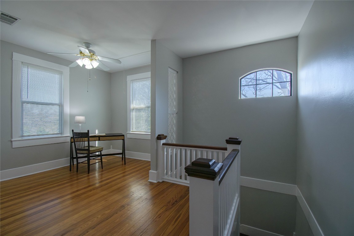 307 Walnut Drive East Austin, TX 78753 - Photo 21 of 34 a view of a livingroom with furniture wooden floor a chandelier