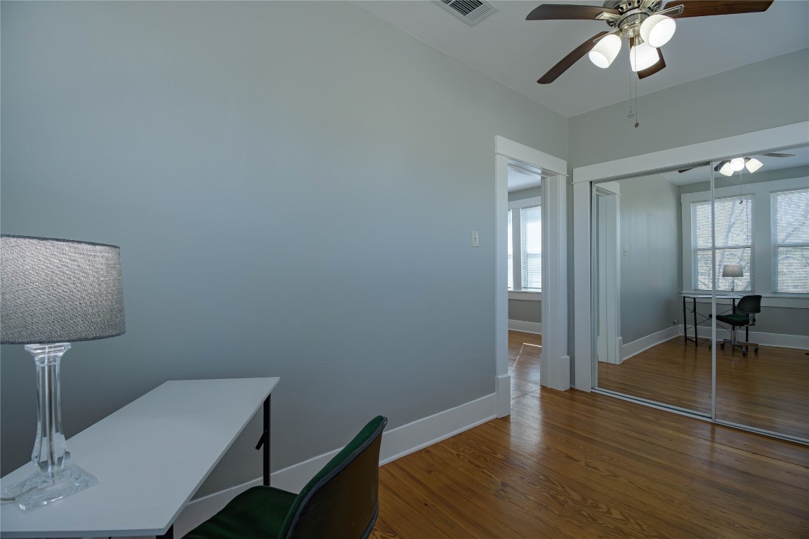 307 Walnut Drive East Austin, TX 78753 - Photo 27 of 34 a view of a room with wooden floor table and chairs