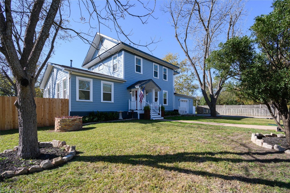 307 Walnut Drive East Austin, TX 78753 - Photo 3 of 34 a view of a house with a yard