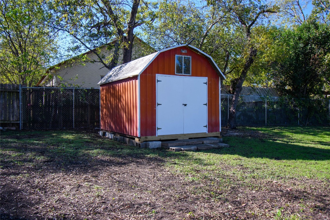 307 Walnut Drive East Austin, TX 78753 - Photo 34 of 34 a front view of a house with garden