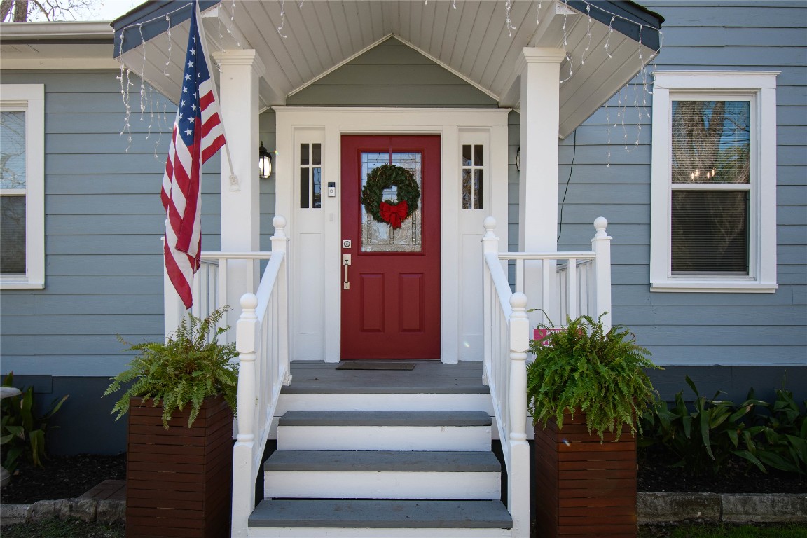 307 Walnut Drive East Austin, TX 78753 - Photo 5 of 34 a front view of a house with entryway