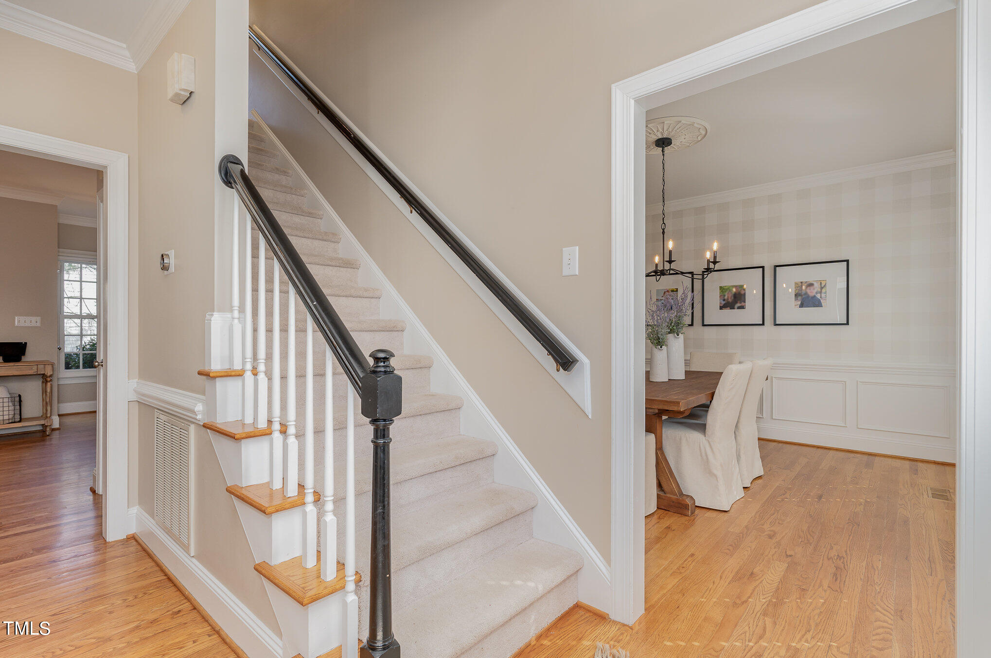 2500 Harptree Court Raleigh, NC 27613 - Photo 11 of 44 a view of entryway and hall with wooden floor