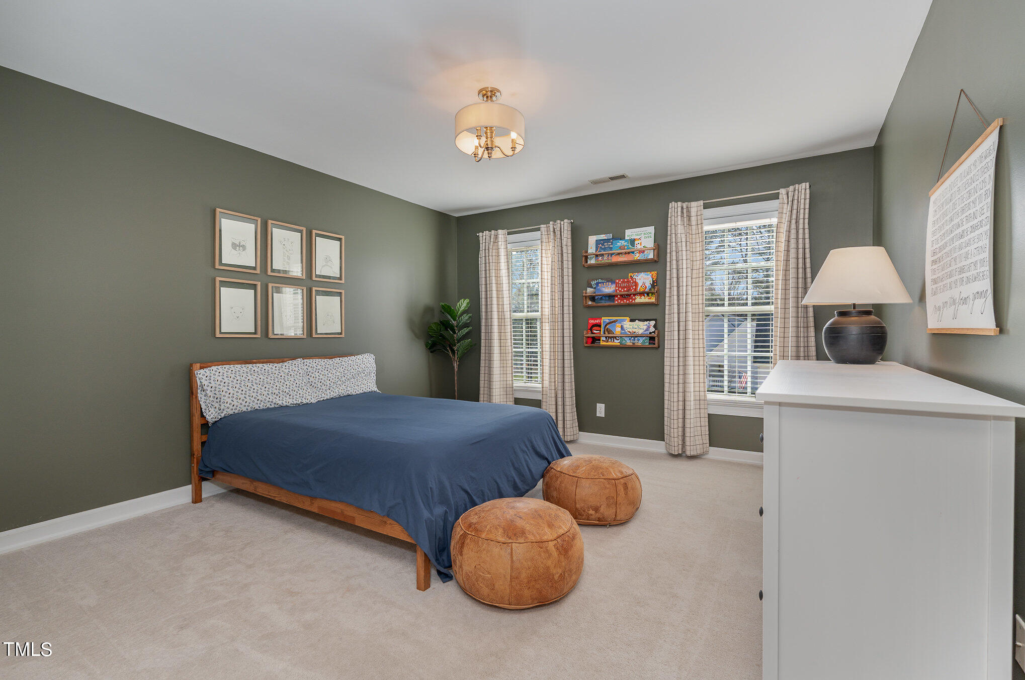 2500 Harptree Court Raleigh, NC 27613 - Photo 20 of 44 a bedroom with a bed and large window