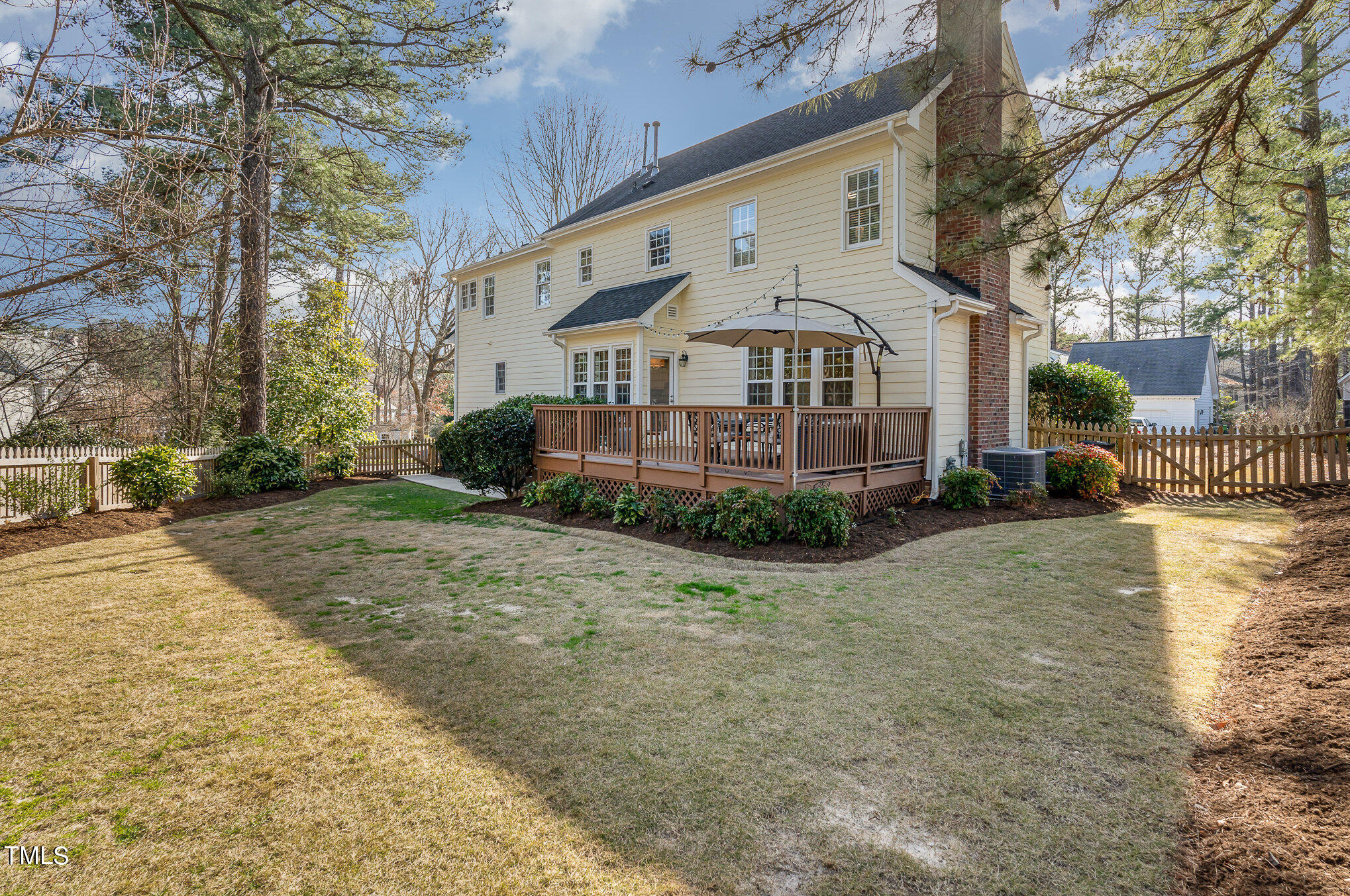 2500 Harptree Court Raleigh, NC 27613 - Photo 31 of 44 a view of a white house with a yard
