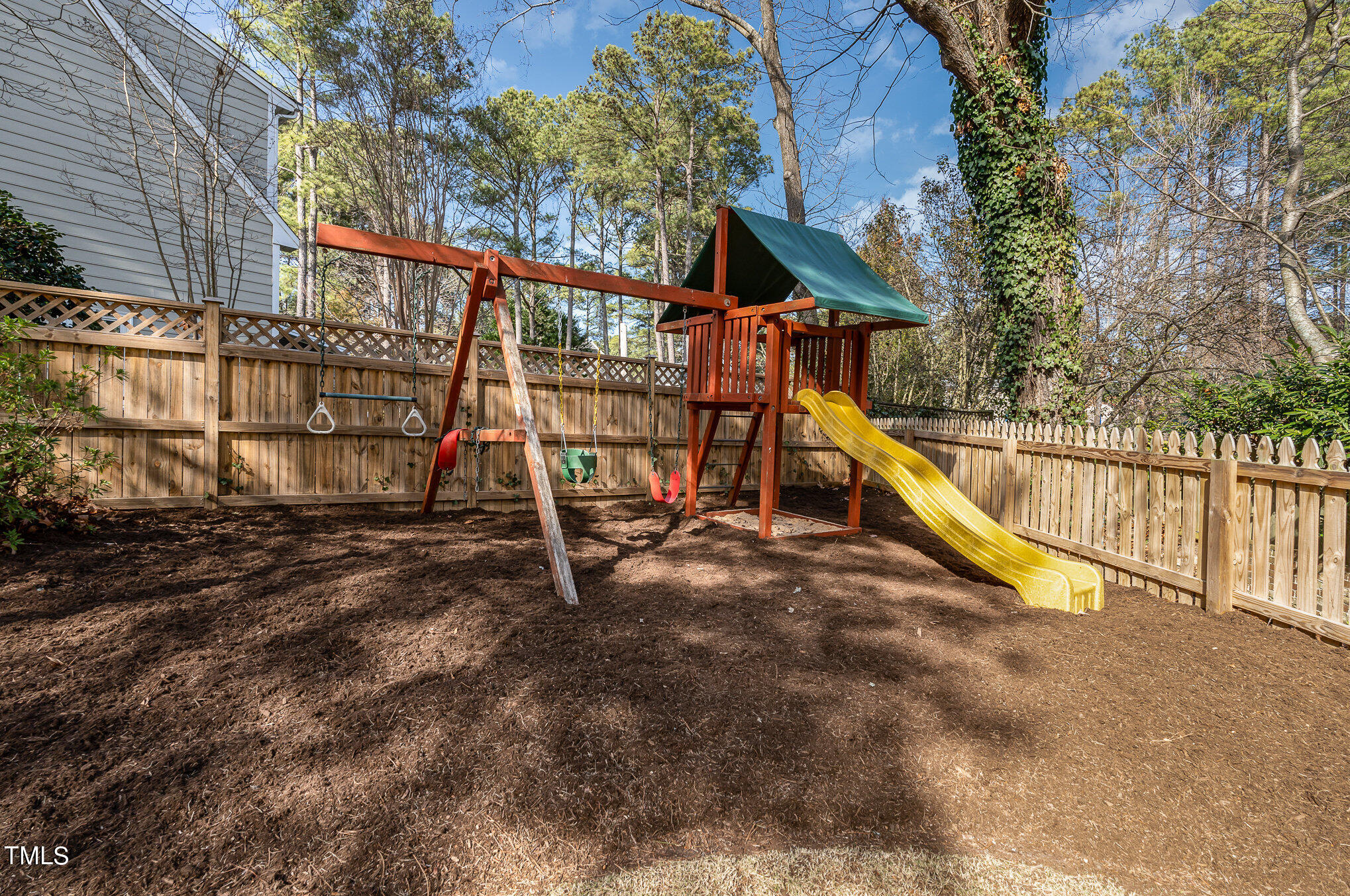 2500 Harptree Court Raleigh, NC 27613 - Photo 35 of 44 a view of wooden deck with a small yard