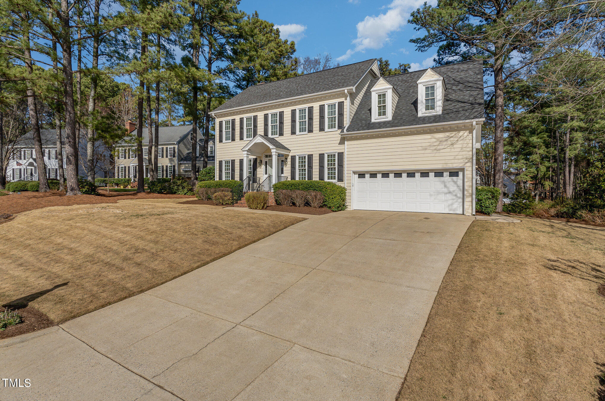 2500 Harptree Court Raleigh, NC 27613 - Photo 8 of 44 front view of a building with a yard