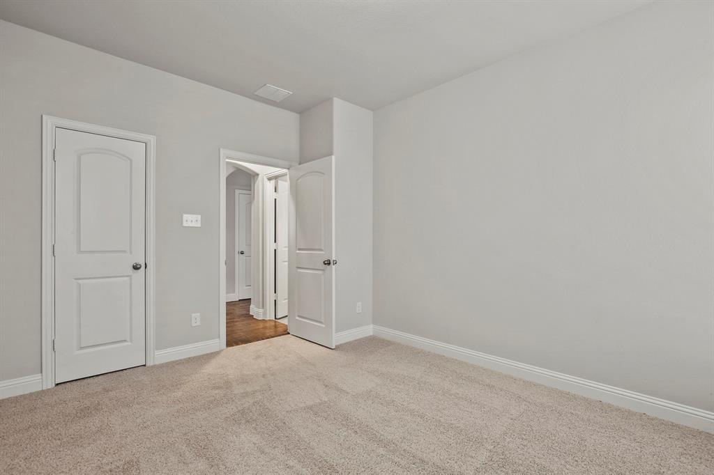 4333 Falcon Lane Carrollton, TX 75010 - Photo 23 of 35 a view of an empty room