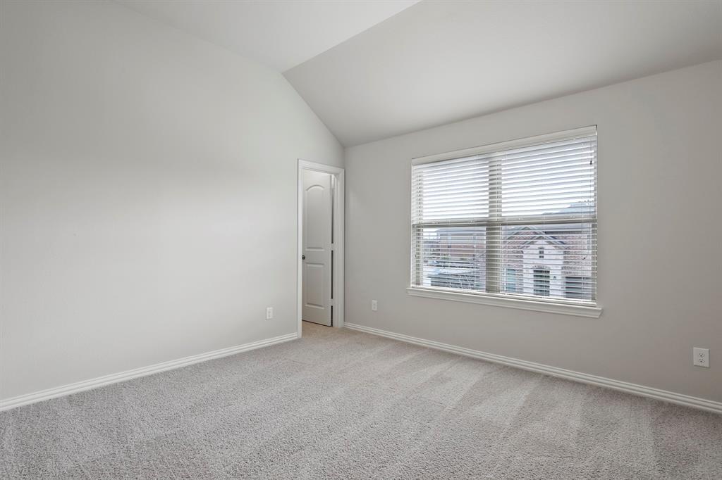 4333 Falcon Lane Carrollton, TX 75010 - Photo 29 of 35 an empty room with a window