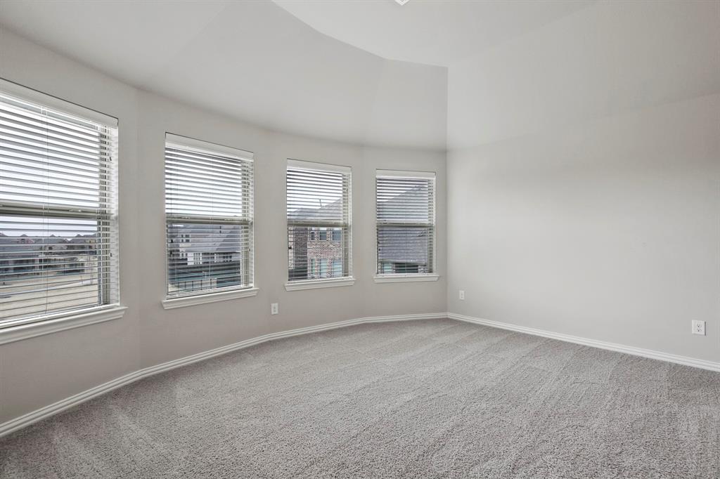 4333 Falcon Lane Carrollton, TX 75010 - Photo 31 of 35 an empty room with windows