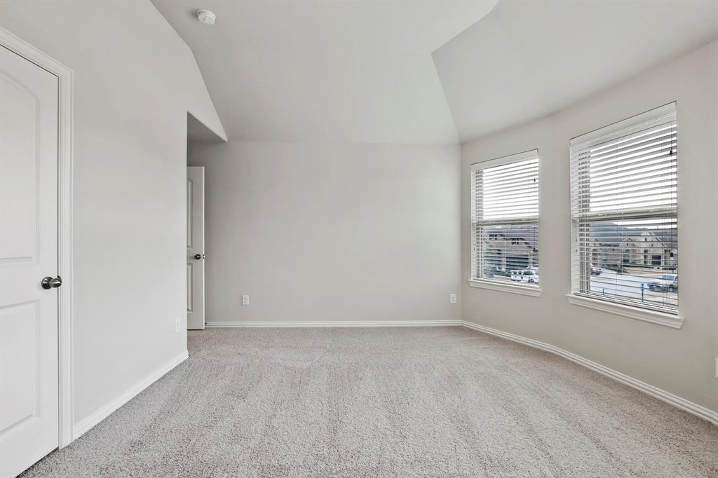 4333 Falcon Lane Carrollton, TX 75010 - Photo 32 of 35 an empty room with windows