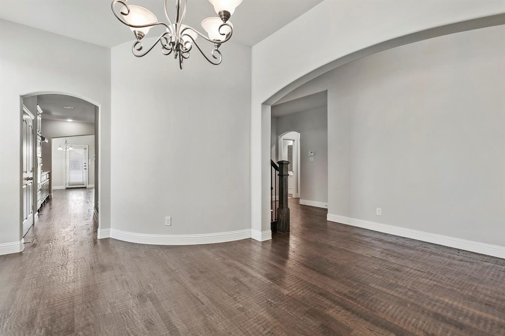 4333 Falcon Lane Carrollton, TX 75010 - Photo 8 of 35 a view of a livingroom with wooden floor