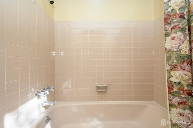 a bathroom with a bathtub