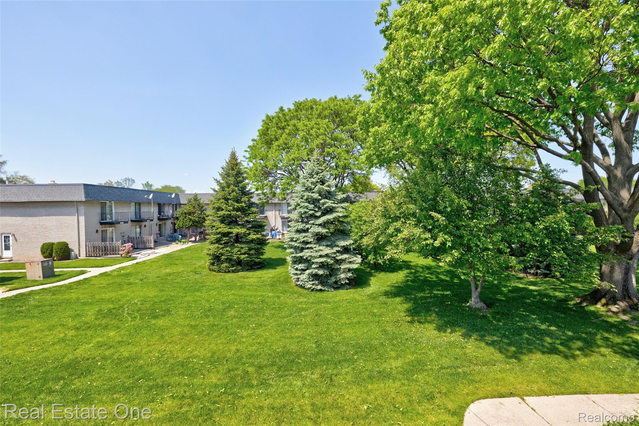 4456 15 Mile Road Sterling Heights, MI 48310 - Photo 19 of 31 21) Upstairs Bedroom 2 Balcony View.jpg