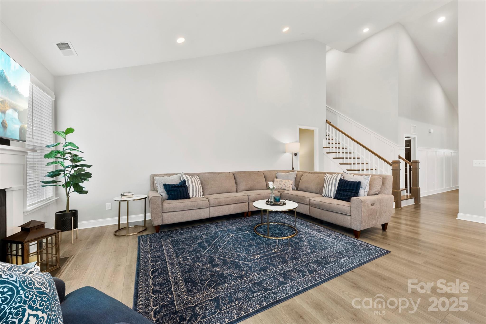 6261 Six String Court Fort Mill, SC 29708 - Photo 11 of 31 a living room with furniture and wooden floor
