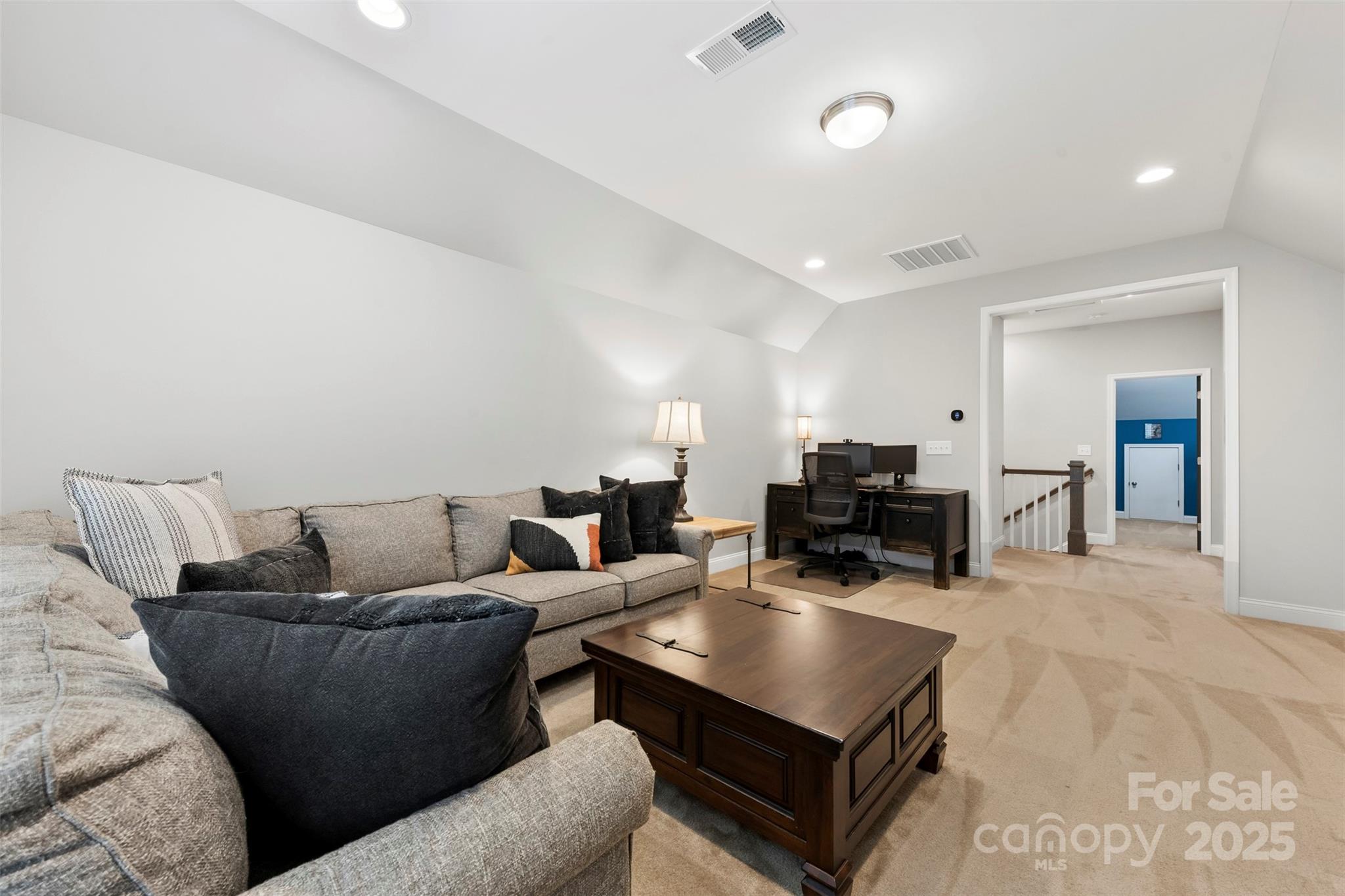 6261 Six String Court Fort Mill, SC 29708 - Photo 13 of 31 a living room with furniture and a flat screen tv