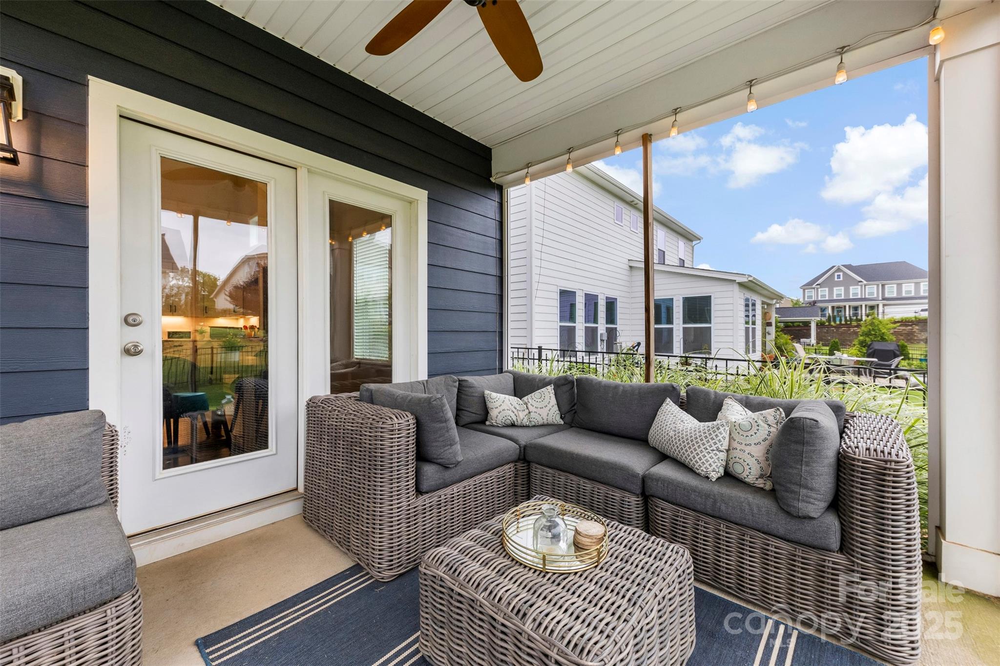 6261 Six String Court Fort Mill, SC 29708 - Photo 24 of 31 a living room with furniture and a large window