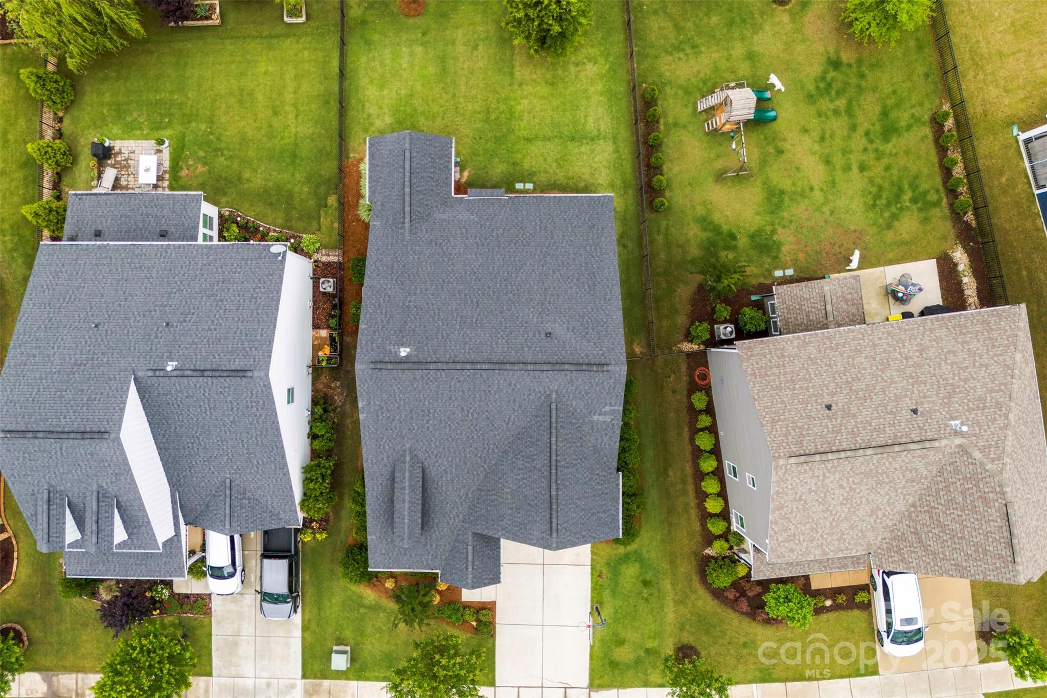6261 Six String Court Fort Mill, SC 29708 - Photo 26 of 31 an aerial view of a house with a yard basket ball court and outdoor seating