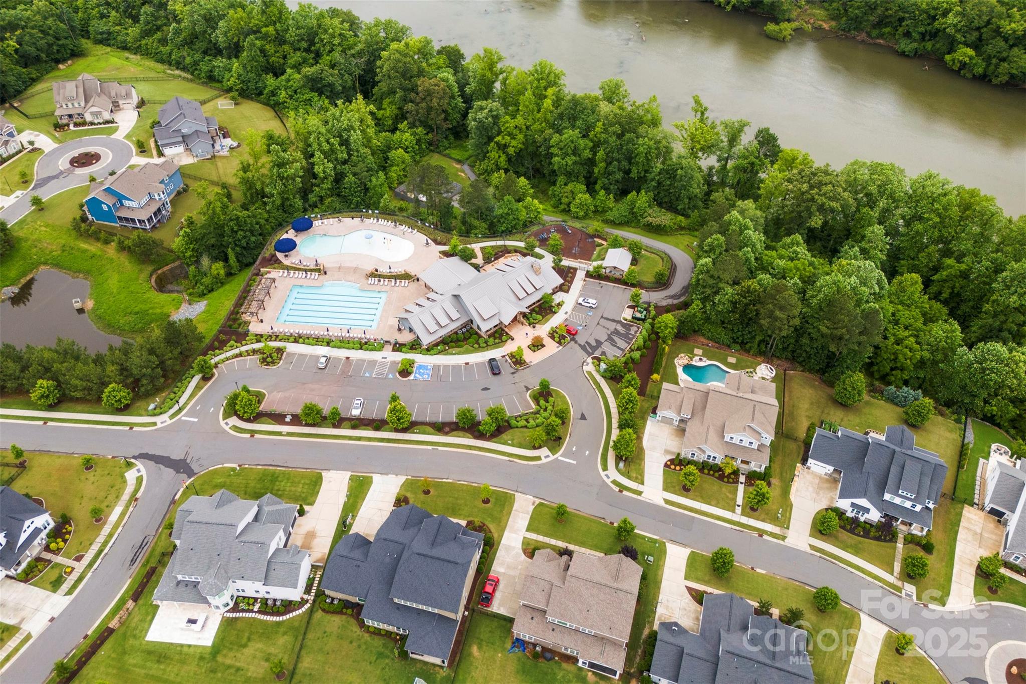 6261 Six String Court Fort Mill, SC 29708 - Photo 27 of 31 an aerial view of a house with a lake view