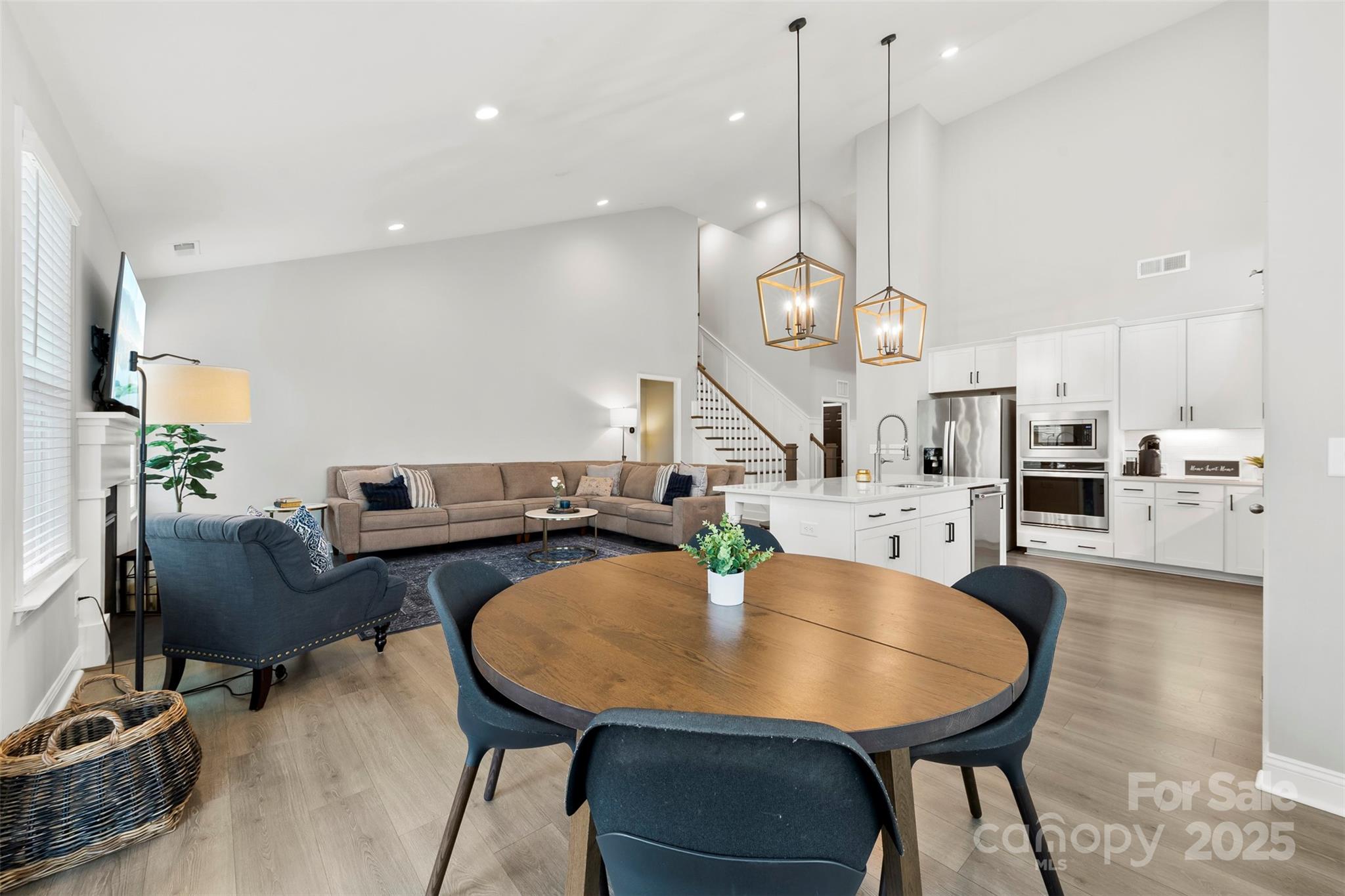 6261 Six String Court Fort Mill, SC 29708 - Photo 9 of 31 a view of a dining room and livingroom