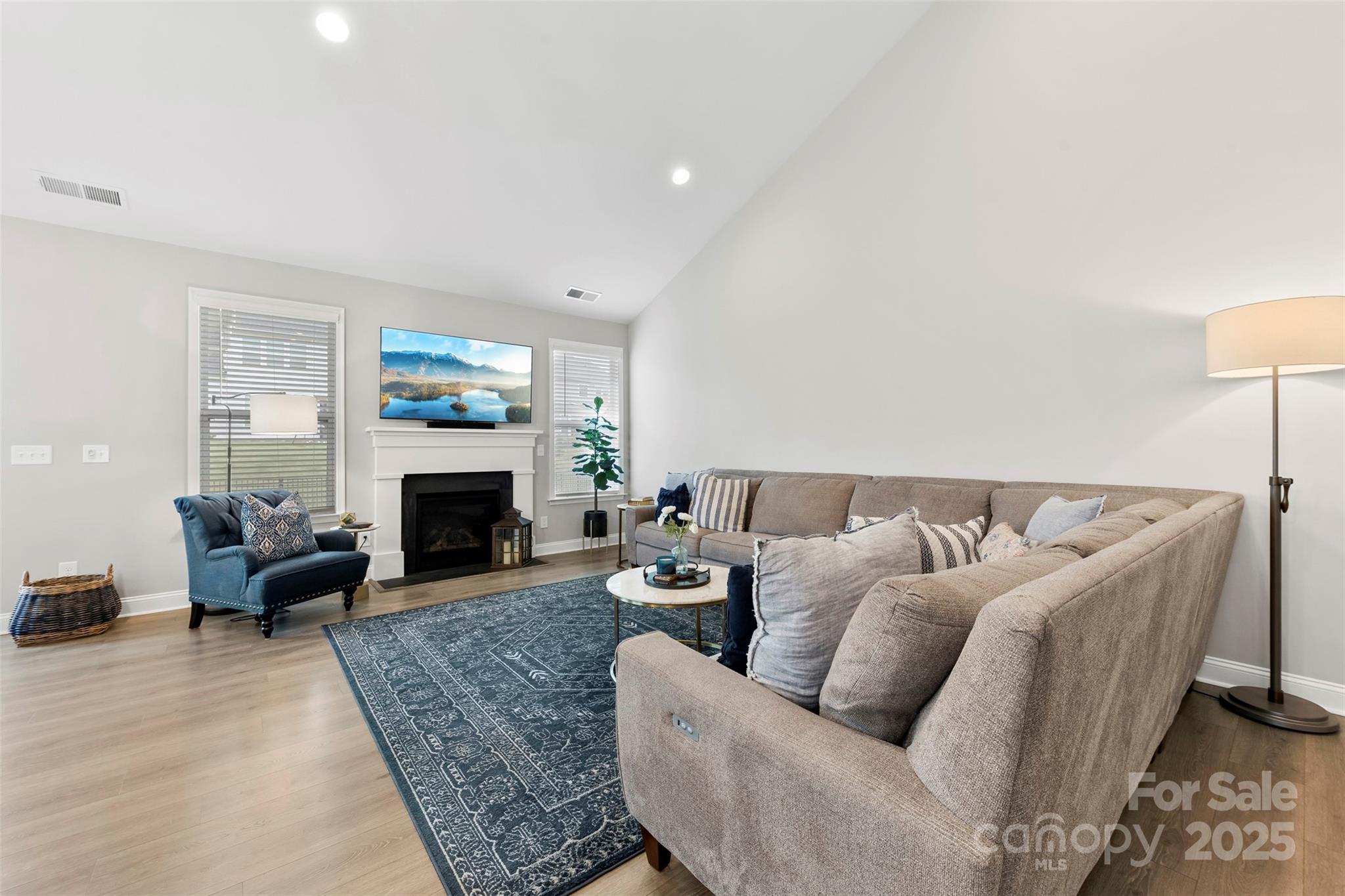 6261 Six String Court Fort Mill, SC 29708 - Photo 10 of 31 a living room with furniture and a fireplace