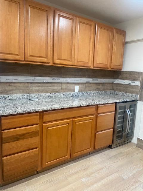 312 North 27th Street Fort Pierce, FL 34947 - Photo 8 of 10 a kitchen with granite countertop cabinets stainless steel appliances and a sink