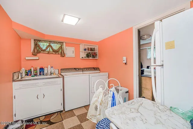 a storage room with a washer and dryer