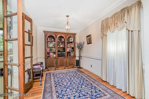 a room with furniture and a rug