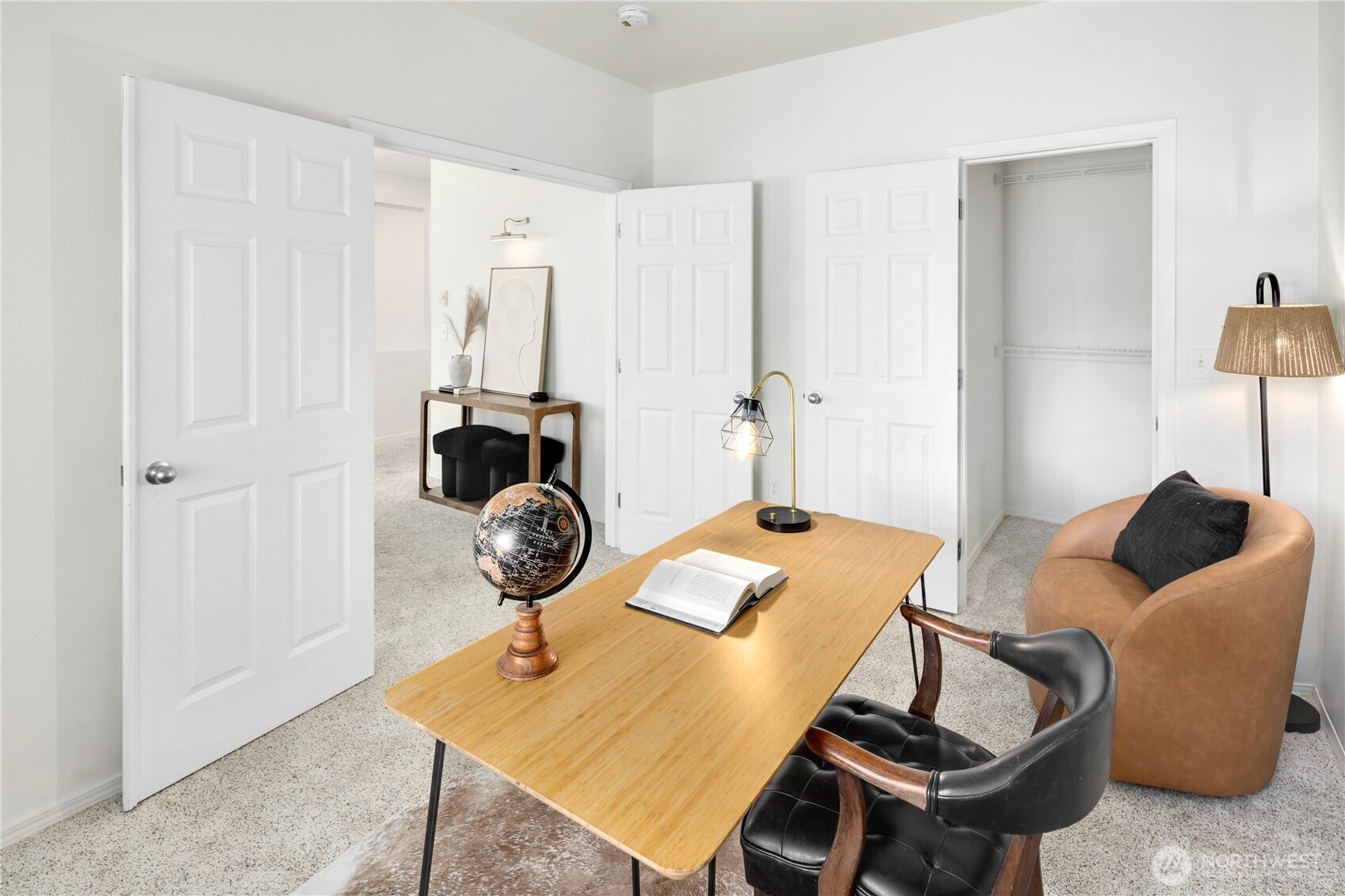 14120 Southeast 171st Way, Unit C303 Renton, WA 98058 - Photo 11 of 21 a bedroom with furniture and wooden floor