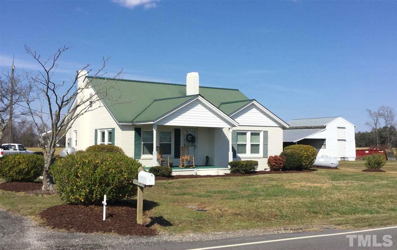 754 Drag Strip Road Benson, NC 27504 - Photo 2 of 16 a house view with a garden space