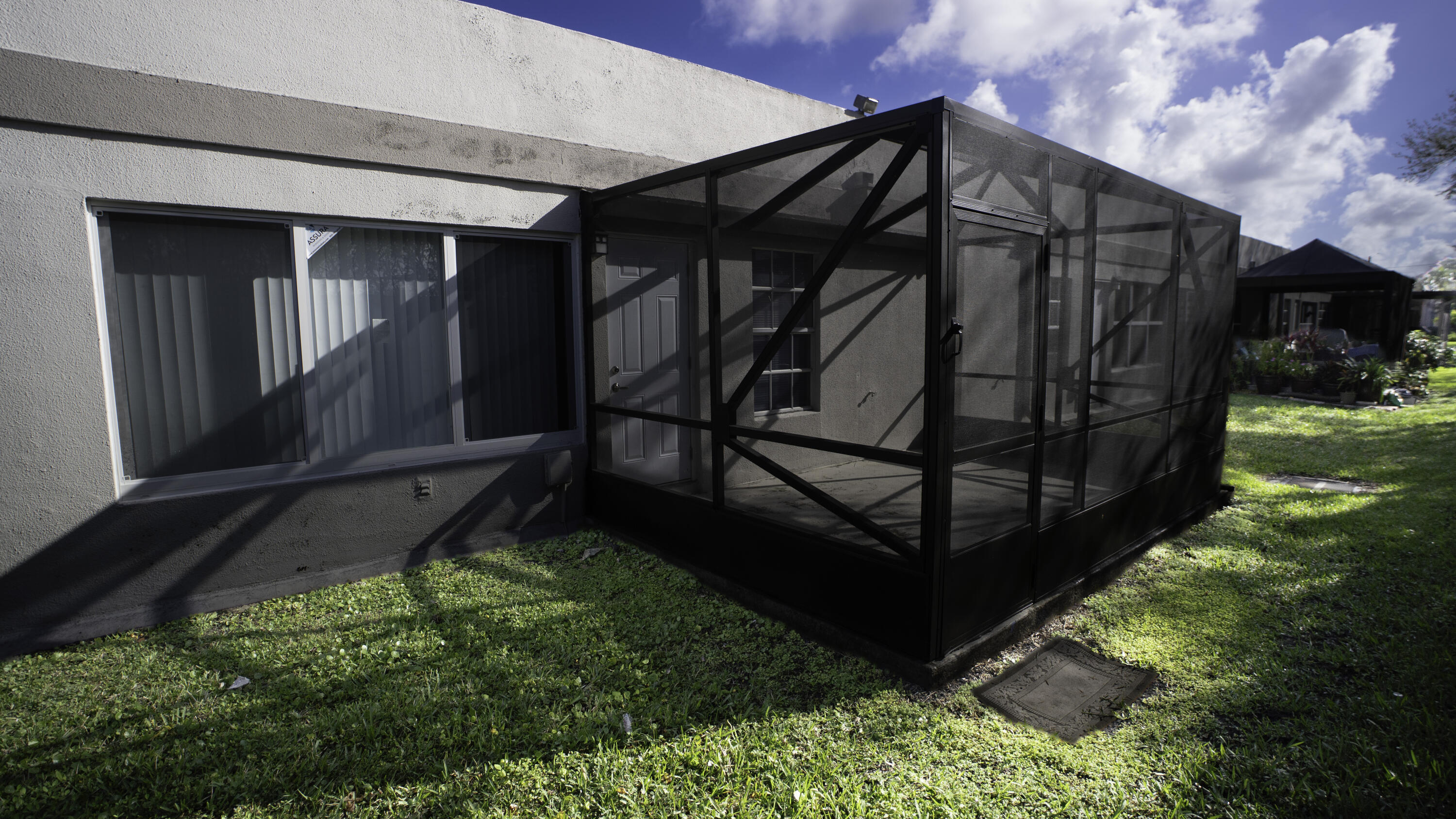 9110 Fairbanks Lane, Unit 4 Boca Raton, FL 33496 - Photo 14 of 15 exterior patio