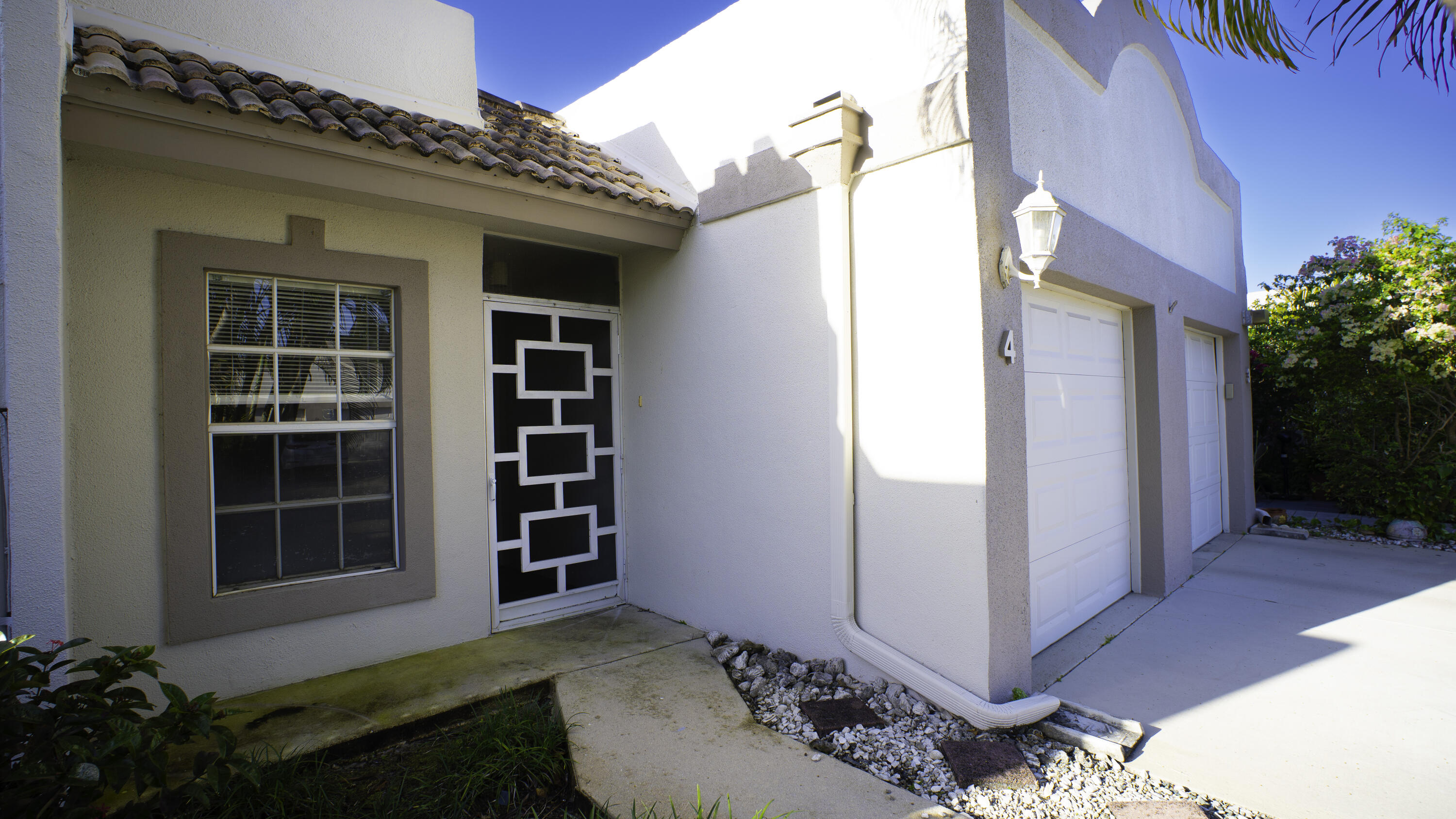 9110 Fairbanks Lane, Unit 4 Boca Raton, FL 33496 - Photo 3 of 15 side front