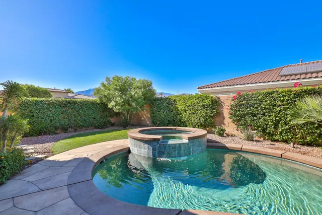 a view of a patio with a yard