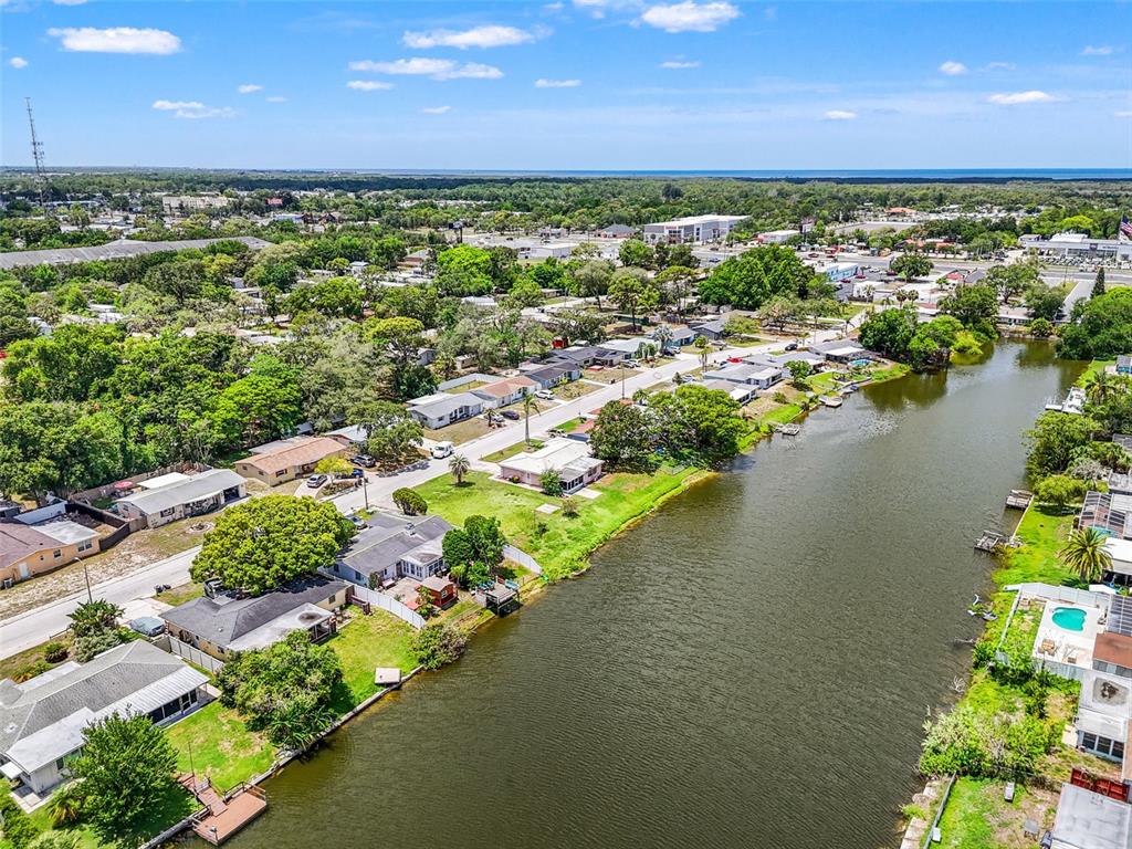 7211 Ashwood Drive Port Richey, FL 34668 - Photo 5 of 12 a view of a lake with a city