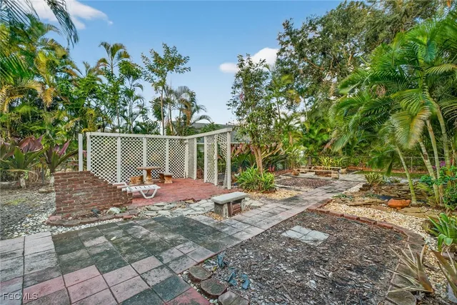 a backyard of a house with lots of green space