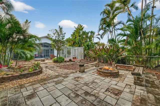 a backyard of a house with seating space