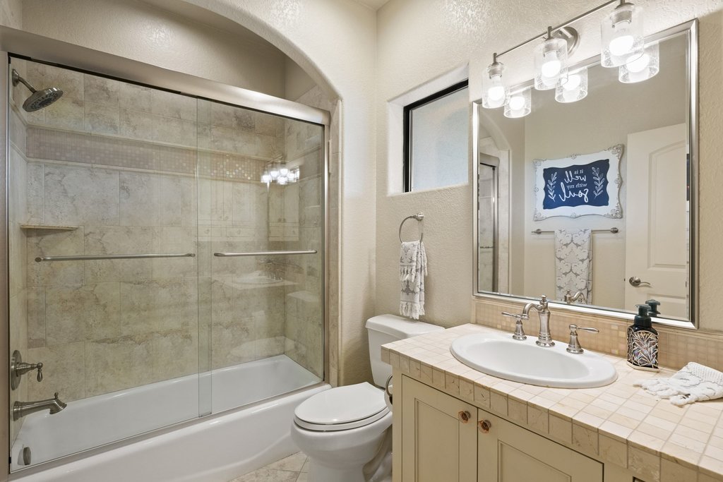 1540 County Road 262 Georgetown, TX 78633 - Photo 36 of 40 Upstairs, bedroom 3 features an ensuite bathroom.