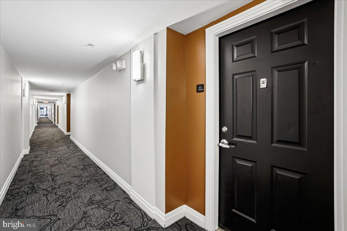 12001 Market Street, Unit T51 Reston, VA 20190 - Photo 2 of 62 Hallway to apartment