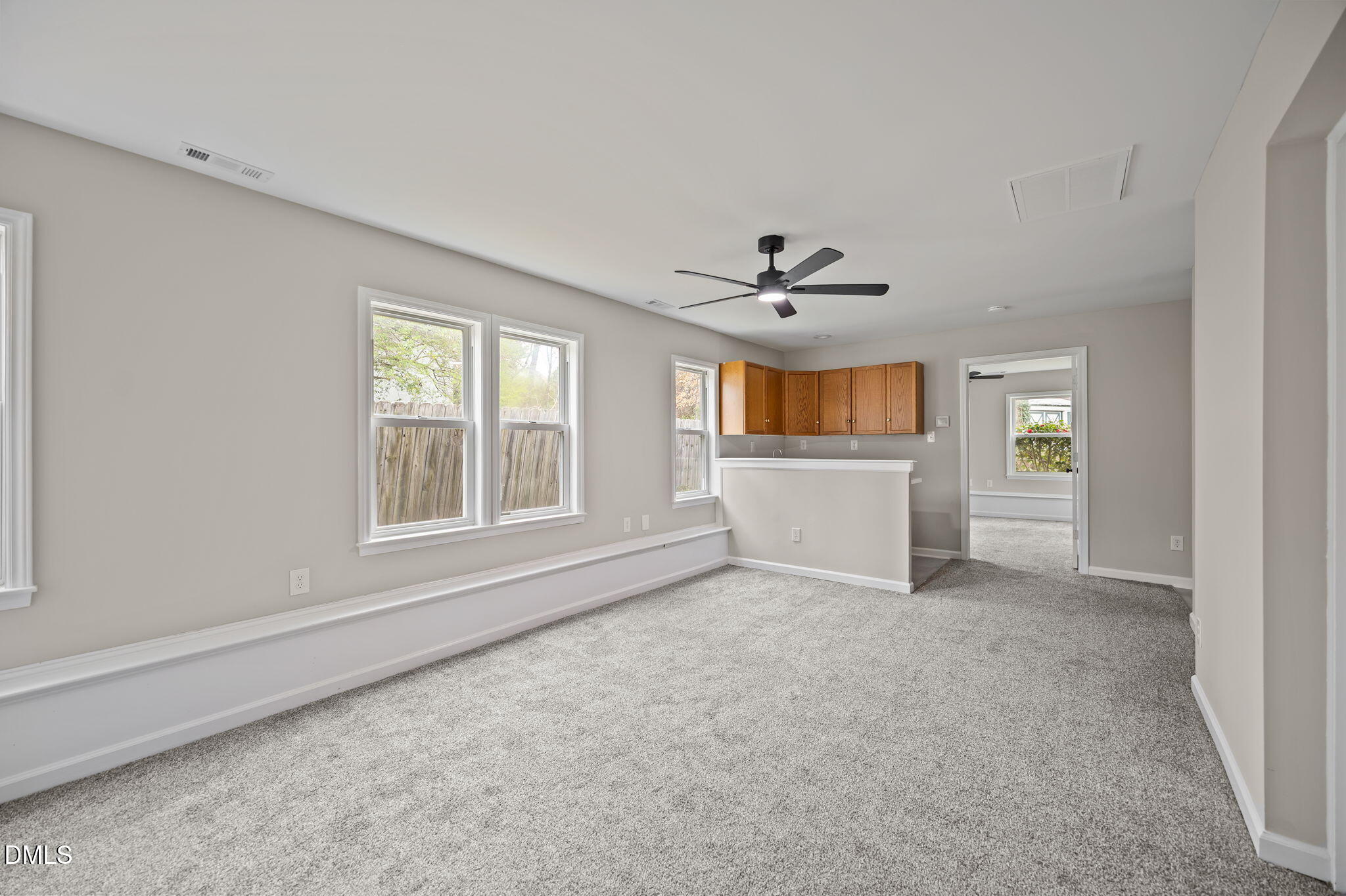 637 Buck Jones Road Raleigh, NC 27606 - Photo 20 of 32 a view of an empty room with a window