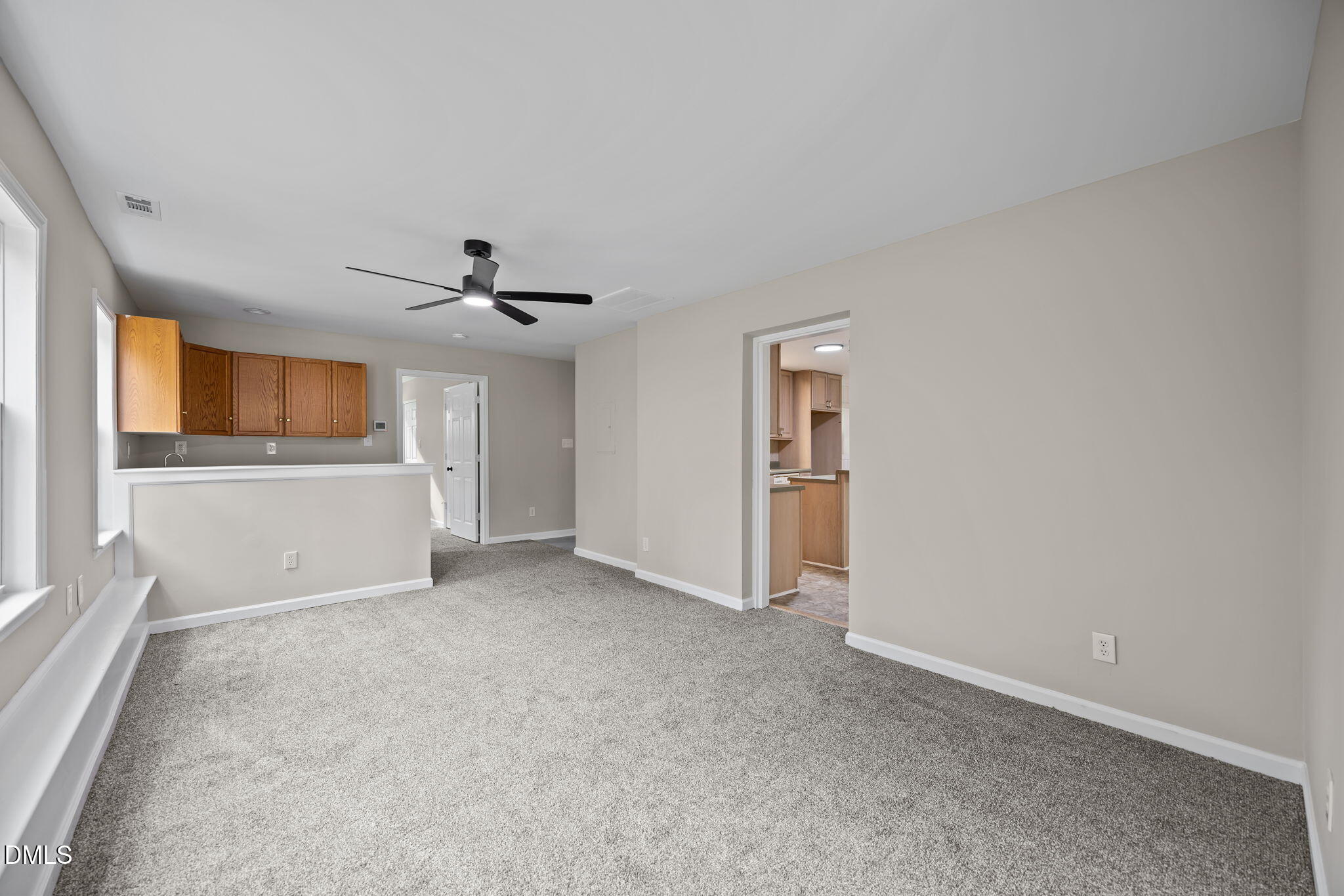 637 Buck Jones Road Raleigh, NC 27606 - Photo 21 of 32 a view of an empty room with a window